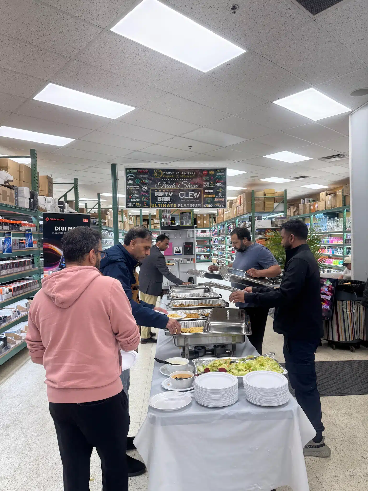 Guests enjoying catering at the event